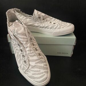 Jenn Ardor slip on canvas tennis shoes; grey/white zebra print